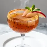 autumn caramel apple cider mocktail - featured image
