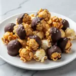 football party salted caramel popcorn clusters - featured image